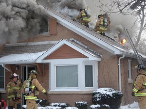 Smoke and Flames From a Home